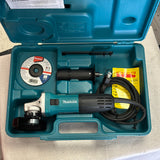 Makita 6 Amp Corded 4 in. Lightweight Angle Grinder with Grinding Wheel, Wheel Guard Side Handle Hard Case