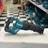 Close-up of the blade clamp and front shoe on a Makita GRJ01Z cordless reciprocating saw