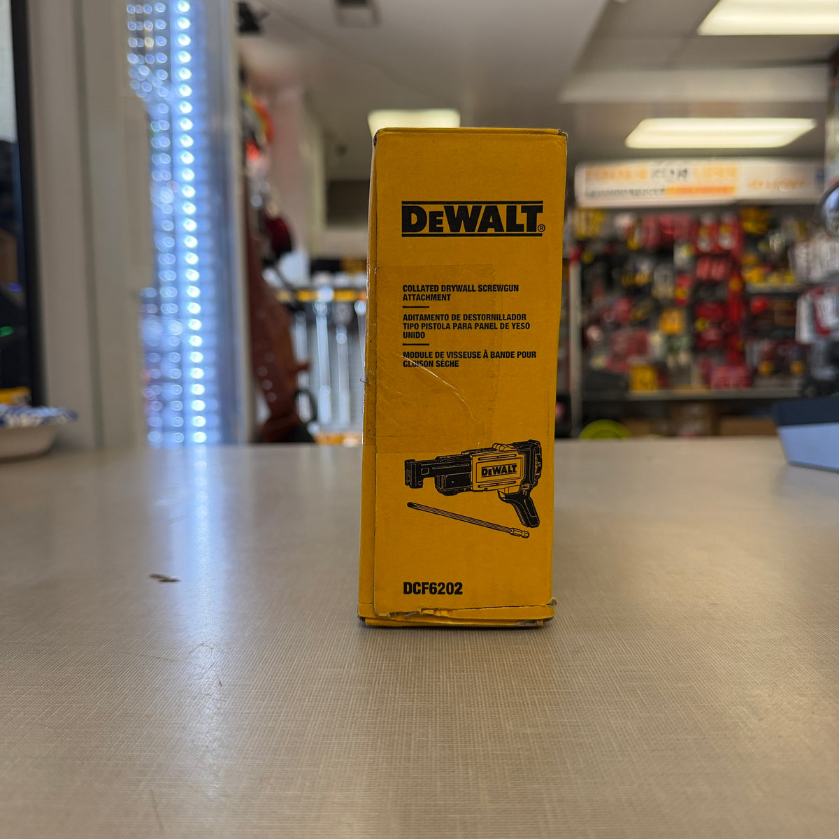 Side of DEWALT DCF6202 collated drywall screwgun attachment box
