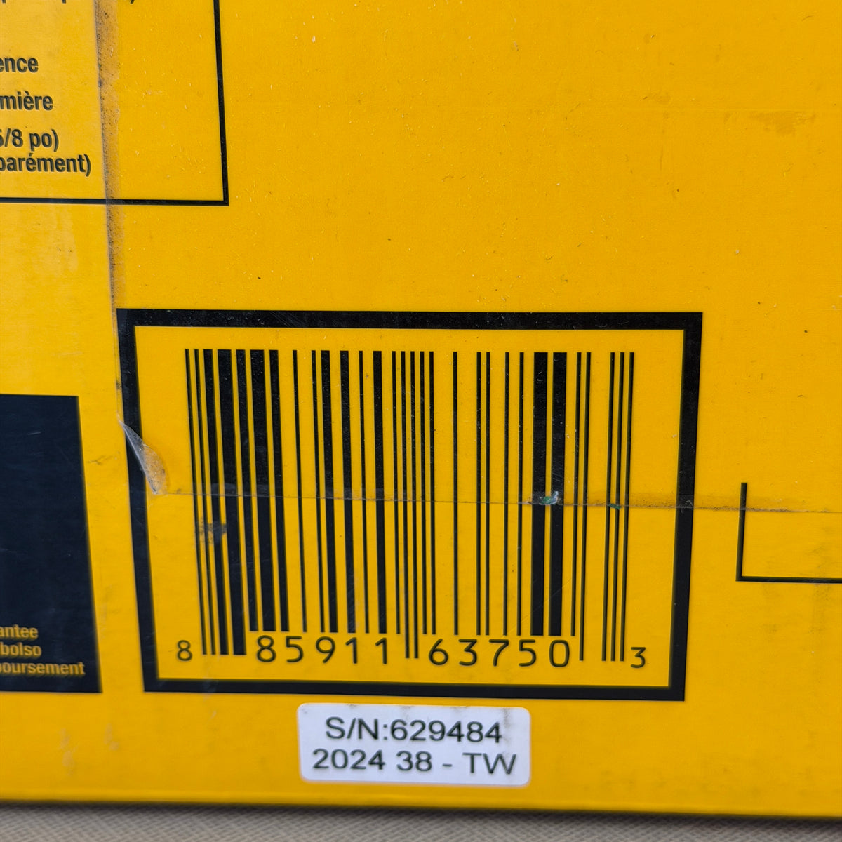 Close-up of DEWALT DCL077B task light box UPC barcode